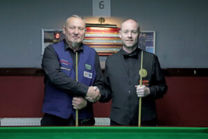 Dalton Lawrence and Dave Bolton shake hands prior to a final earlier in the season