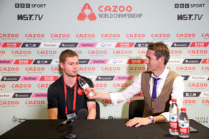 Matthew Haslam faces a mock interview with Rob Walker backstage at the Crucible Theatre during the World Championship