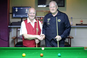 Ronnie Allen and Mike Gillespie shake hands before their final match