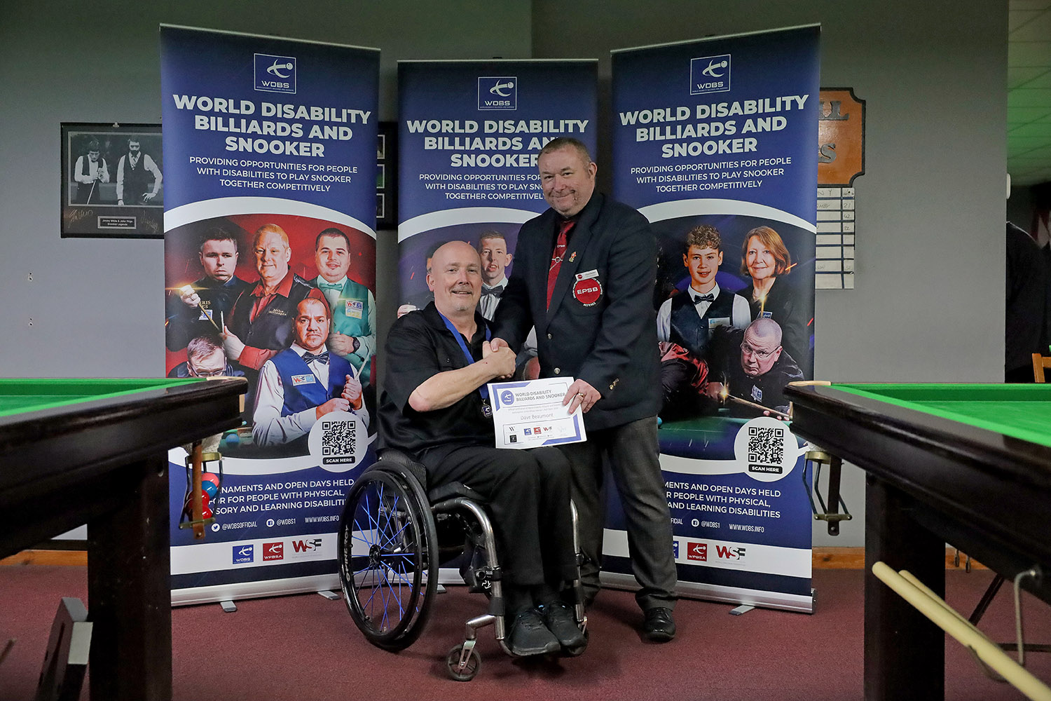 Dave Beaumont receives certificate from Stuart Barker