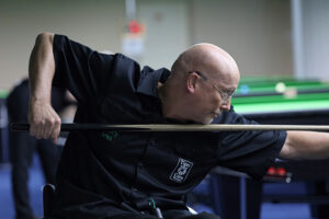 Dave Beaumont playing a snooker shot