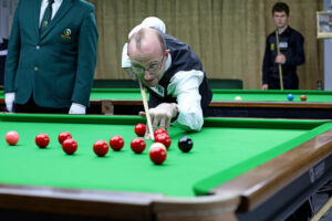 Daniel Blunn plays a snooker shot