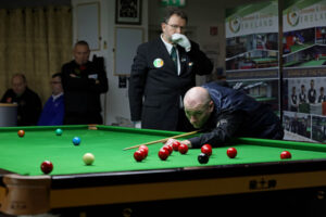 Dave Bolton plays a snooker shot