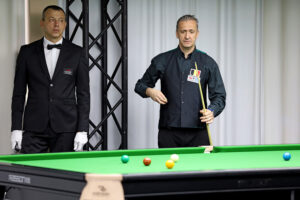 Kristof De Bruyn prepares to take a snooker shot