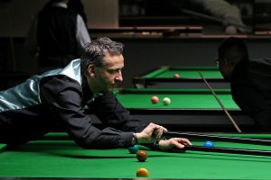 Kristof De Bruyn plays a snooker shot