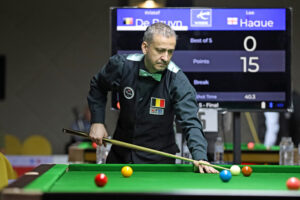 Kristof De Bruyn plays a snooker shot