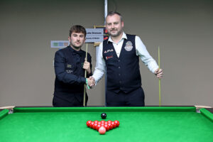 Luke Drennan and Colvin O'Brien shake hands before their final