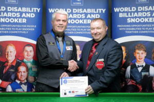 Carl Gibson shakes hands with tournament director Stuart Barker at the Hull Open
