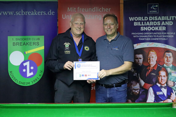 Mike Gillespie receives his certificate at the 2024 German Open