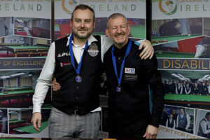 Colvin O'Brien and Gary Taylor pose after their final